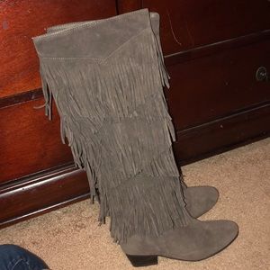 Tall dark brown fringe boots